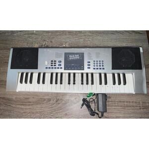 First Act Discovery Electronic Keyboard with Power Adapter